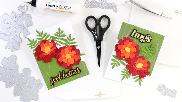 The photo shows the two finished cards, featured in this post. 